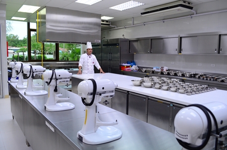A school chef prepares to show off the cooking demonstration room.